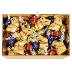 Farverig Lindt Chokolade Påske Rede | 310 g | 8 x Mini gyldne kaniner, 26 x Lindor mælkechokoladeæg, 15 x Lindor hvide chokoladeæg, 10 x Lindor mørk chokoladeæg | Påskechokolade | Gave af chokolade