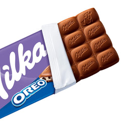 Milka Oreo – Alpine mælkechokolade fyldt med sprøde stykker af Oreo kiks og glat vaniljecreme – 100g