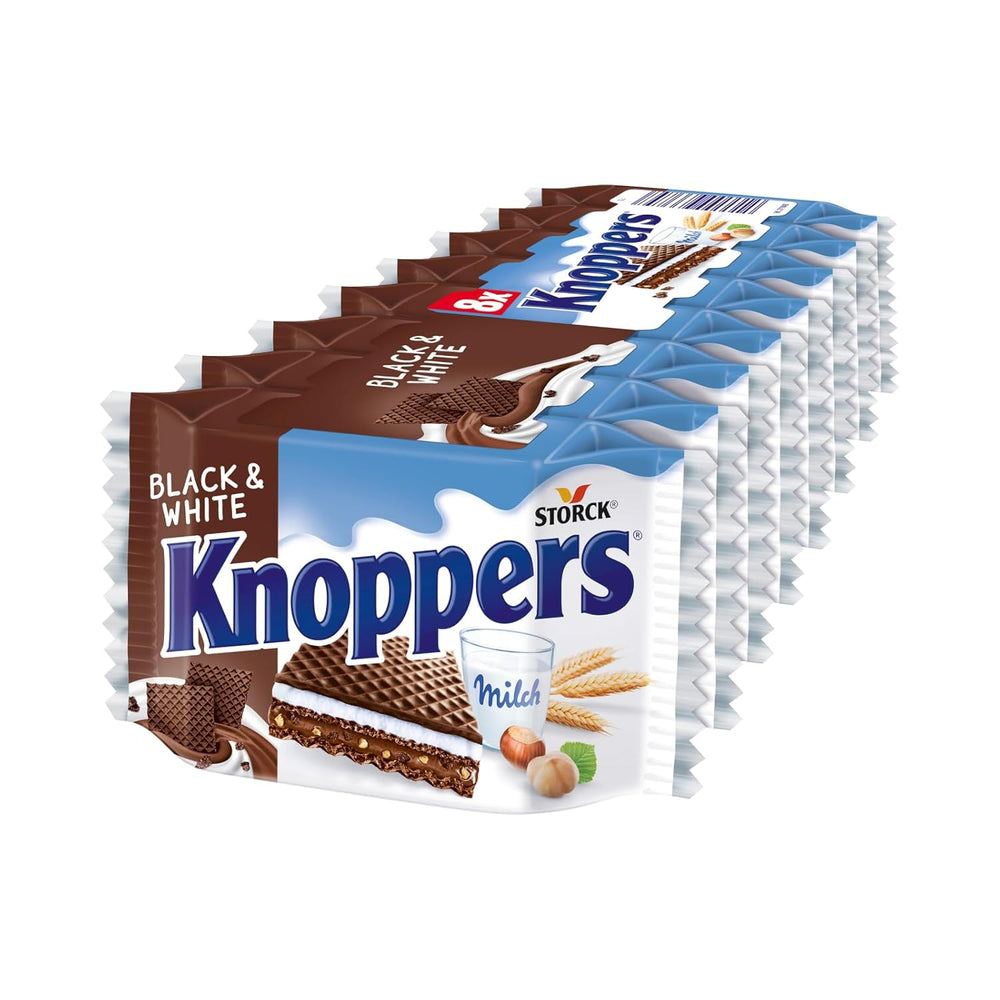 Hvide og sorte Knoppers – 8 x 25 g – Vaffelskiver fyldt med mørke kakaoblater, stykker af sorte kiks, mælk og nougatcreme