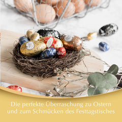 Ouă LINDOR cu ciocolată Lindt | 4 cutii a câte 450 g fiecare | Ouă LINDOR cu umplutură care se topește în gură, din ciocolată cu lapte, albă, neagră și cu alune | Ciocolată de Paște | Cadou de ciocolată | Ouă de Paște | Ouă de ciocolată