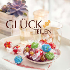 Lindt Chokolade | Assorteret taske LINDOR sølv | 1 kg pose | 80 mælkechokoladekugler smeltet i munden, 70%, saltet karamel og dobbelt chokoladesmag | Gave af chokolade at dele