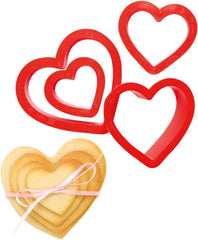 0255305 Set forme de biscuiți în formă de inimă, netede, 4 bucăți, 4-5,5-7-8 cm, 2,2 cm înălțime, roz