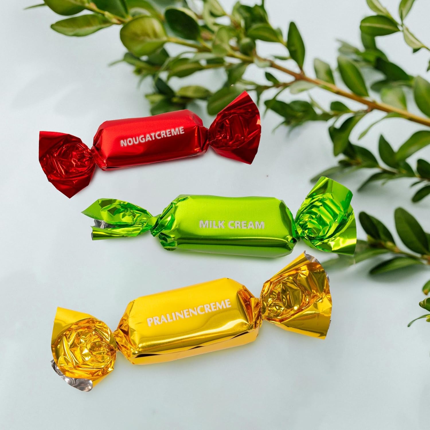 Heidel påskekort gaveæske 183g, premium mælkechokoladepraline med dekorativ metalæske, ideel som påskegave