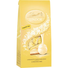 Lindt Chokolade | LINDOR poser til cheesecake | 137g | 10 mælkechokoladekugler med ostekagefyld, der smelter i munden | Chokolade gave