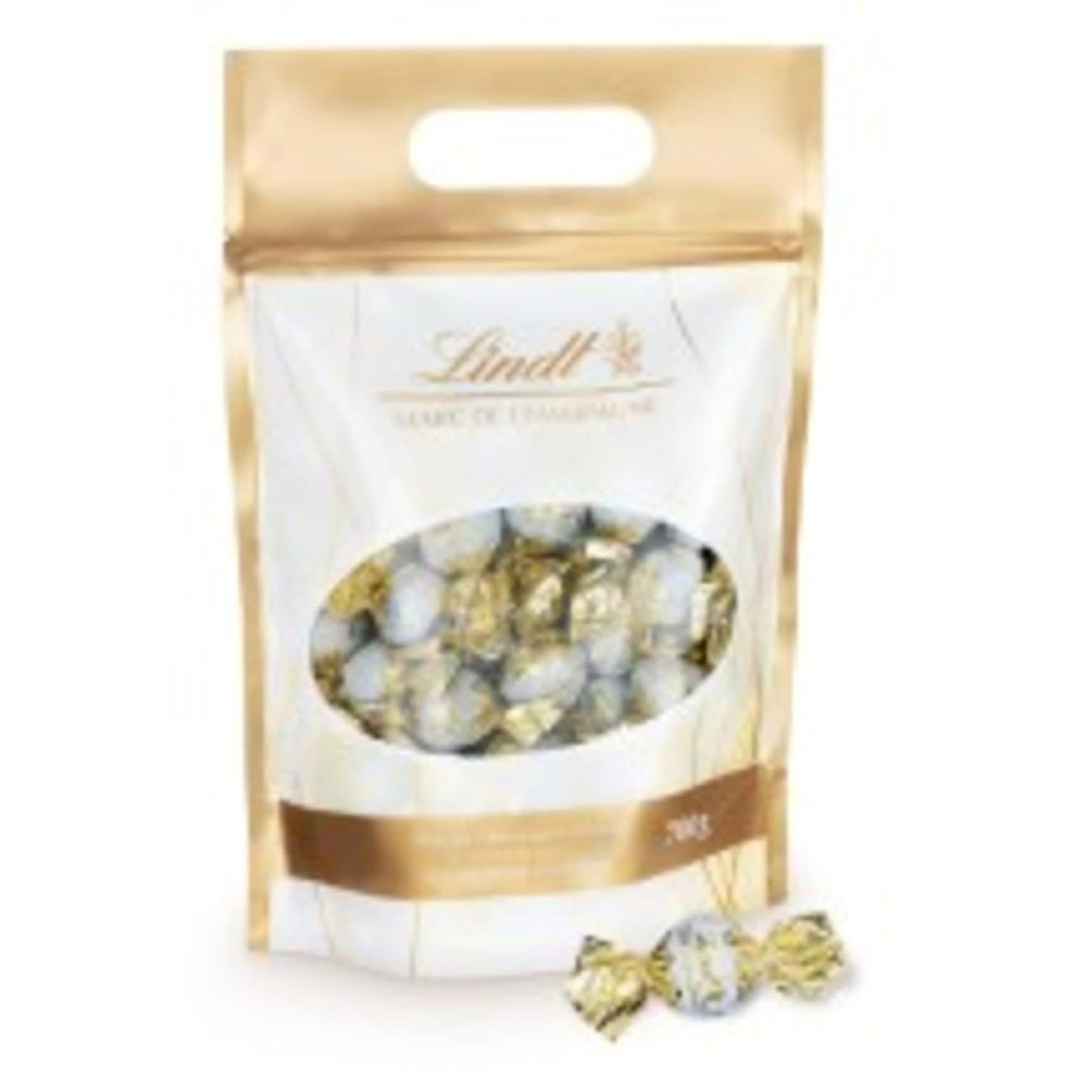 Lindt Marc de Champagne Chokoladekugler | 700 g Ca. 56 mælkechokoladebolsjer med raffineret fyld, indeholder alkohol | Bulk pakke | Gave af chokolade | Chokolade gave