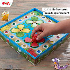 HABA Jumping Game - Terningespil for 3 år og opefter med pop-up åkander og spilvariationer, fremmer tælle og motoriske færdigheder, 2-4 spillere - 1305272001