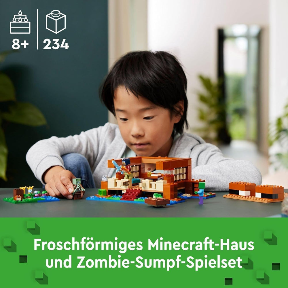 LEGO Minecraft Frøhuset, legetøjshus med figurer inklusive zombie, slim og druknende mand, plus tilbehør som legetøjsbåd og arbejdsbord, gave til drenge og piger fra 8 år 21256 Byggesæt Besuche den LEGO-Store