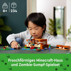 LEGO Minecraft Frøhuset, legetøjshus med figurer inklusive zombie, slim og druknende mand, plus tilbehør som legetøjsbåd og arbejdsbord, gave til drenge og piger fra 8 år 21256 Byggesæt Besuche den LEGO-Store