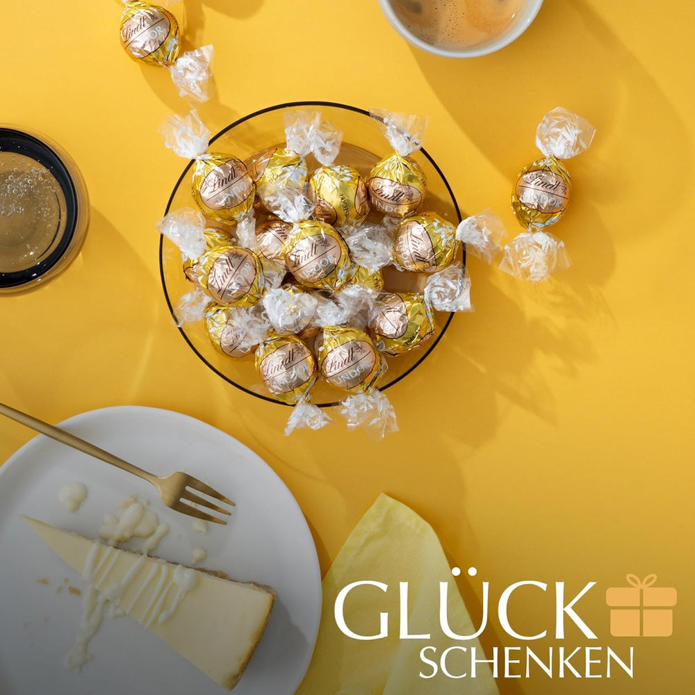Lindt Chokolade | LINDOR Cheesecake Taske | 1 kg | 80 hvide mælkechokoladekugler med ostekagefyld, smeltet i munden | Gave af chokolade at dele