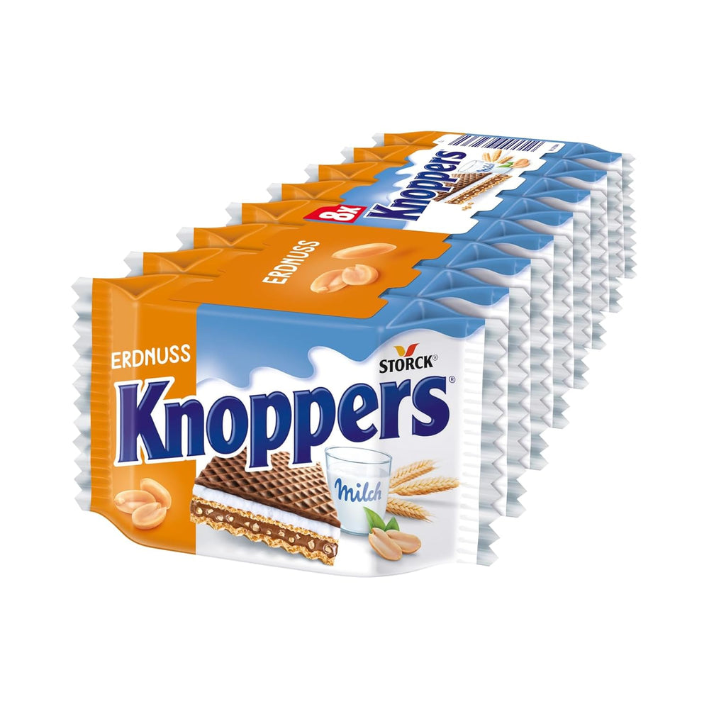 Hvide og sorte Knoppers – 8 x 25 g – Vaffelskiver fyldt med mørke kakaoblater, stykker af sorte kiks, mælk og nougatcreme