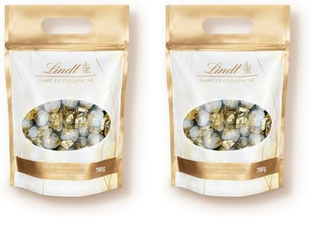 Lindt Marc de Champagne Chokoladekugler | 700 g Ca. 56 mælkechokoladebolsjer med raffineret fyld, indeholder alkohol | Bulk pakke | Gave af chokolade | Chokolade gave