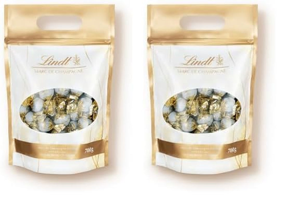 Lindt Marc de Champagne Chokoladekugler | 700 g Ca. 56 mælkechokoladebolsjer med raffineret fyld, indeholder alkohol | Bulk pakke | Gave af chokolade | Chokolade gave