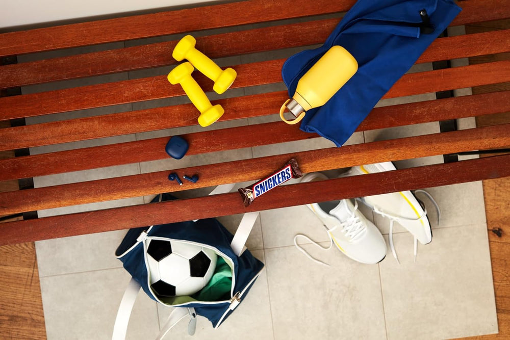 En stor chokoladepakke indeholdende 32 chokoladebarer á 50 g hver.