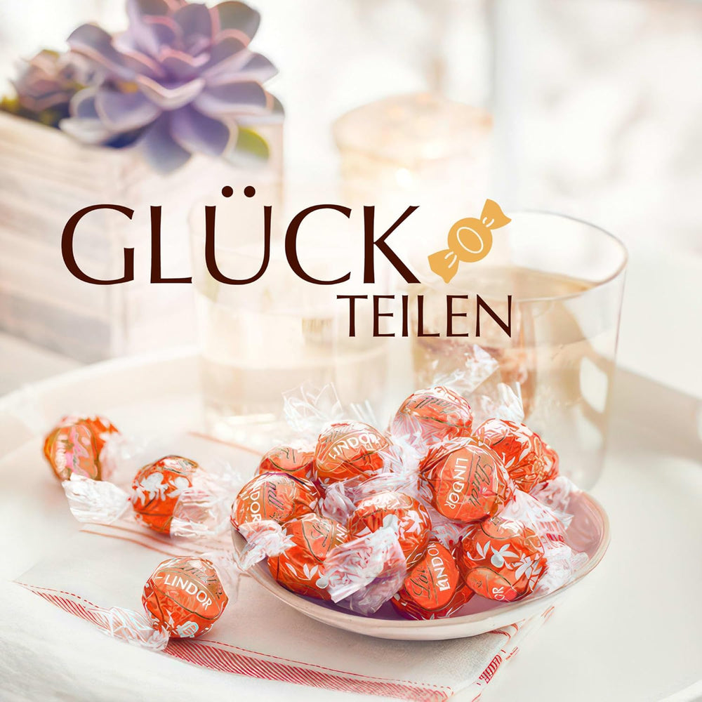 Lindt LINDOR Rød Orange Chokoladekugler | 1 kg genlukkelig pose | ca. 80 chokoladebolsjer med smelte-i-mund-fyld | Bulkpakke, chokoladegave