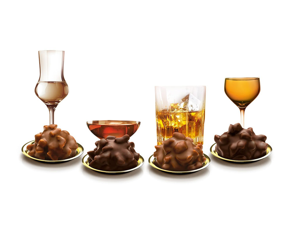 Fine dråber i brandy klassiske nødder 250 g væskefyldte chokoladepraliner med mælkechokoladeglasur og sprøde hasselnøddestykker