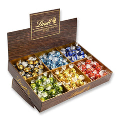 Lindor Chokolade Toppræsentation | 1718 g og chokoladebarer med marcipan | 25 barer x 50g i et tællerdisplay | 1250 g | Ren marcipan overtrukket med mørk chokolade | Chokoladebarer