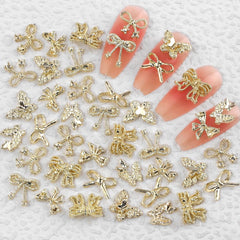 50Stück 3D Gold Bow Nail Charms Butterfly Nail Art Charms Legierung Bogen Nagel Charms Nägel Zubehör Schleife Nagelschmuck Metall Schleifen Schmetterling Nageldesign Nagelanhänger Nailart Strasssteine