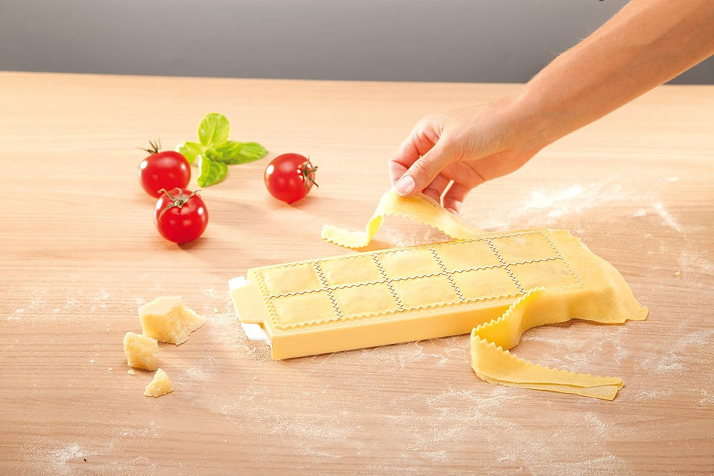 Formă Tescoma pentru ravioli rotunde, suport pentru 10 bucăți.