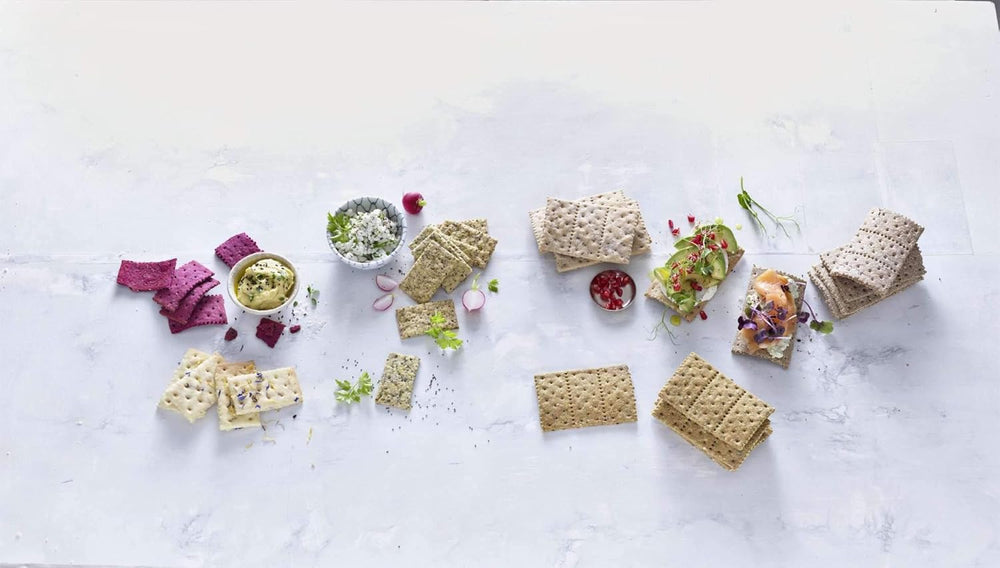 Betty Bossi Cracker Roller, den ideelle køkkengadget til at lave Knäckebrot und Crackern für raffiniertes Fingerfood. Teigschneider mit tolle Rezeptideen.