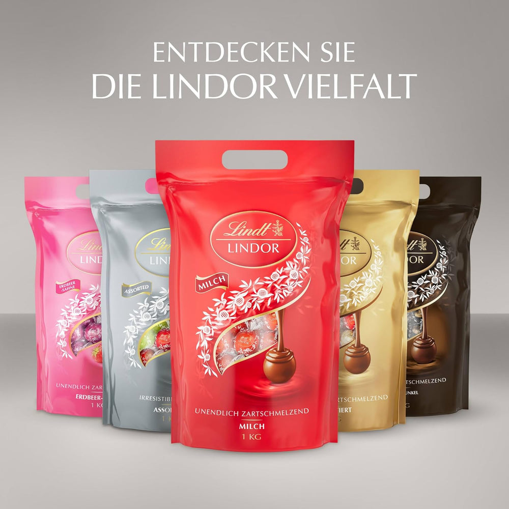 Lindt Chokolade | Assorteret taske LINDOR sølv | 1 kg pose | 80 mælkechokoladekugler smeltet i munden, 70%, saltet karamel og dobbelt chokoladesmag | Gave af chokolade at dele